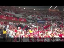 Polish fans dance in Spodek